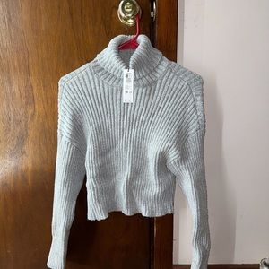 Grey knit cropped turtle neck sweater